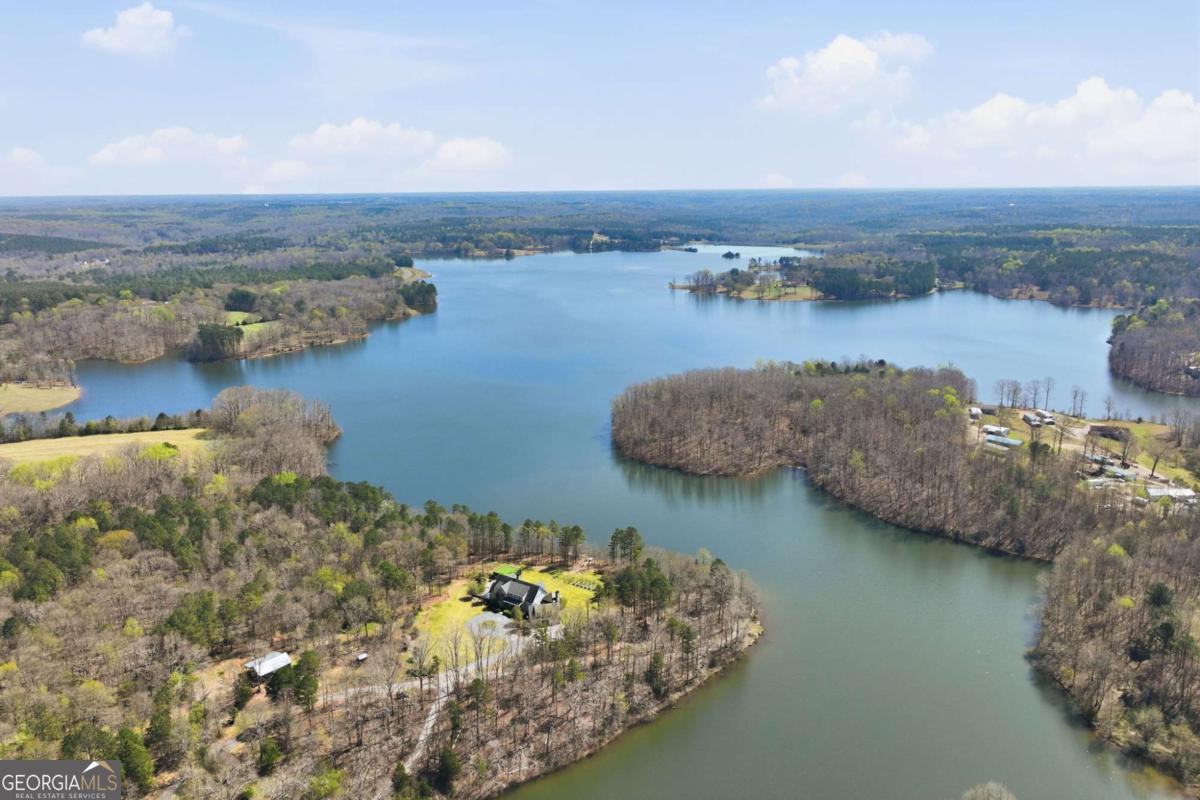 508 Providence Road Statham, GA 30666 - Photo 38 of 39 a view of a lake with houses in the back