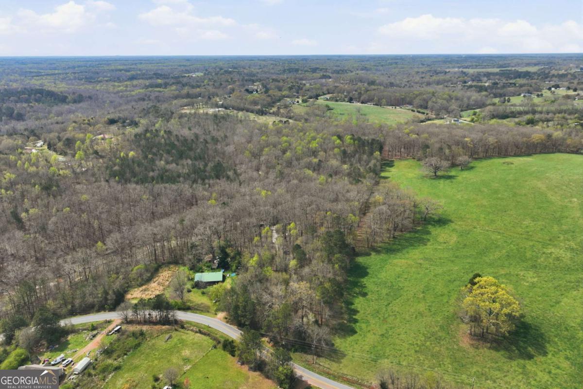 508 Providence Road Statham, GA 30666 - Photo 5 of 39 an aerial view of residential houses with outdoor space and trees