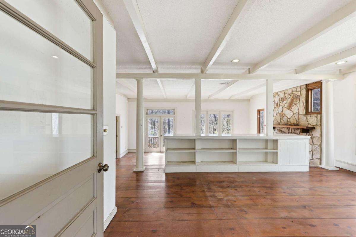 508 Providence Road Statham, GA 30666 - Photo 9 of 39 a view of kitchen with cabinets and wooden floor