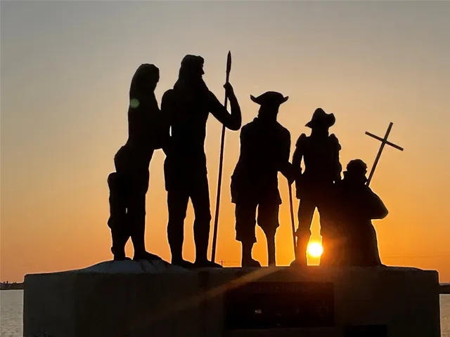 a view of a chairs and table in a balcony