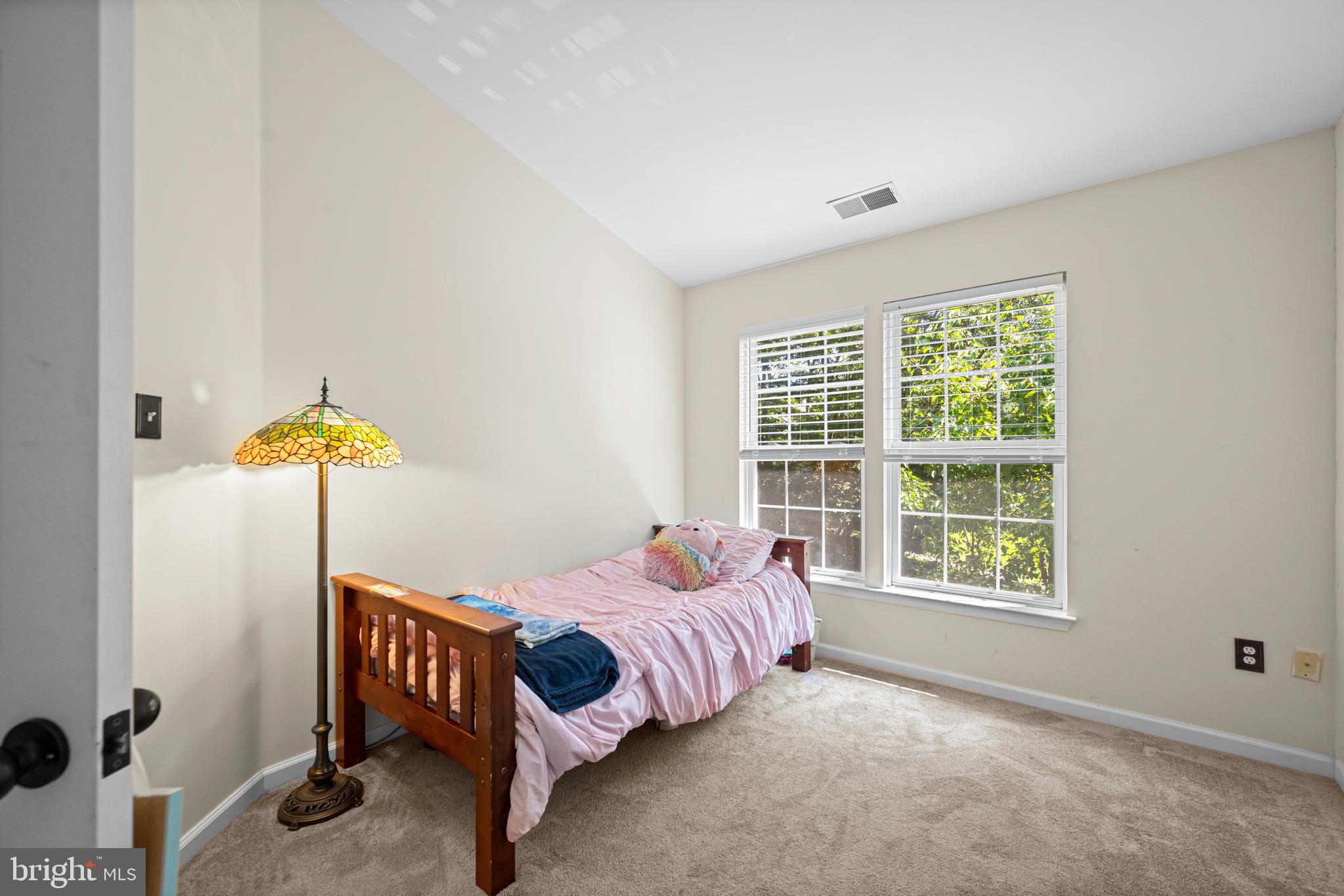 9837 Sherwood Farm Road Owings Mills, MD 21117 - Photo 15 of 35 a bedroom with bed and a window
