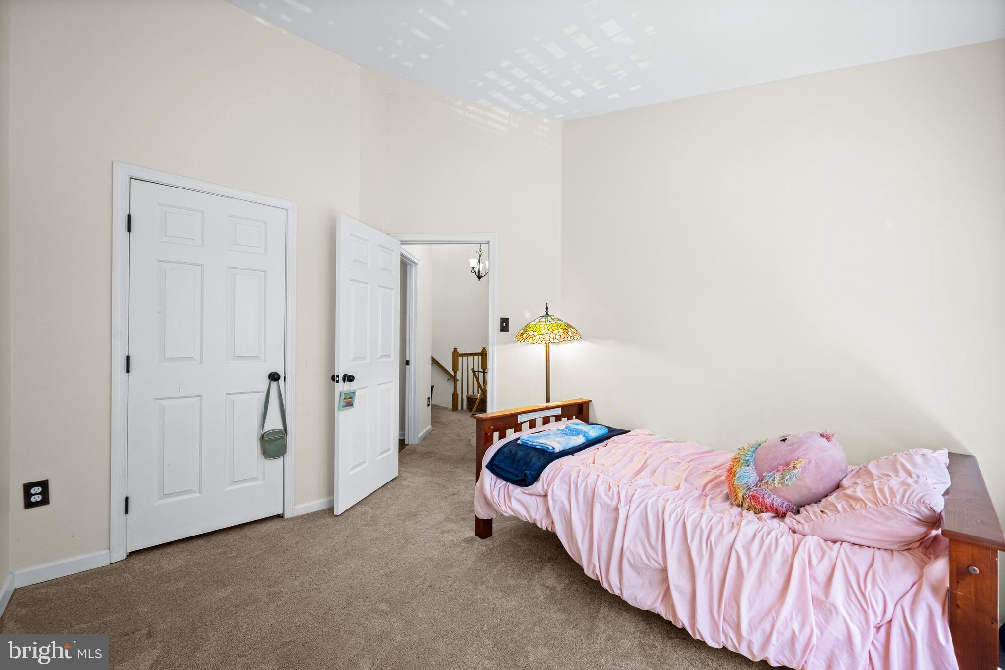 9837 Sherwood Farm Road Owings Mills, MD 21117 - Photo 16 of 35 a bedroom with a bed and gym equipment