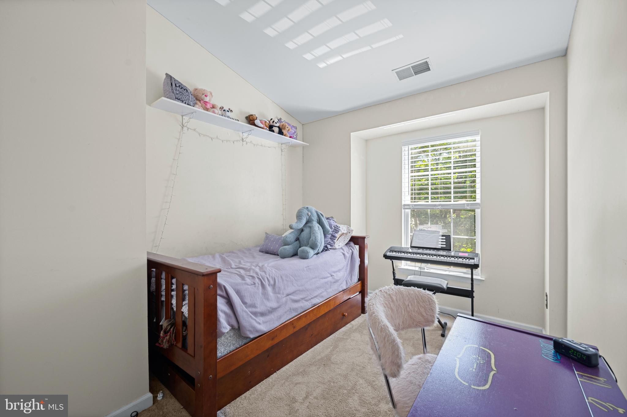 9837 Sherwood Farm Road Owings Mills, MD 21117 - Photo 17 of 35 a bedroom with a bed and window