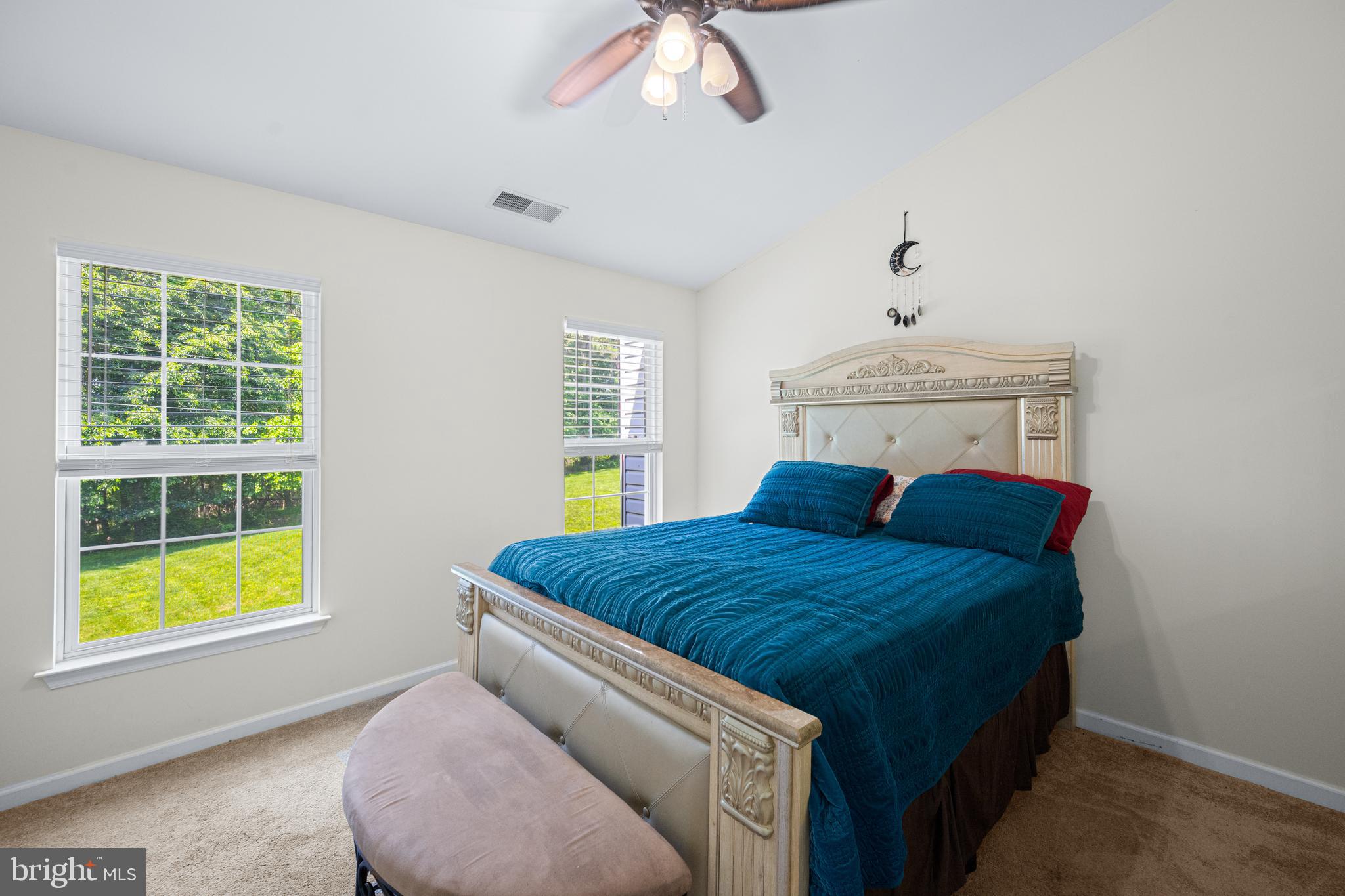 9837 Sherwood Farm Road Owings Mills, MD 21117 - Photo 20 of 35 a bedroom with a bed and a window