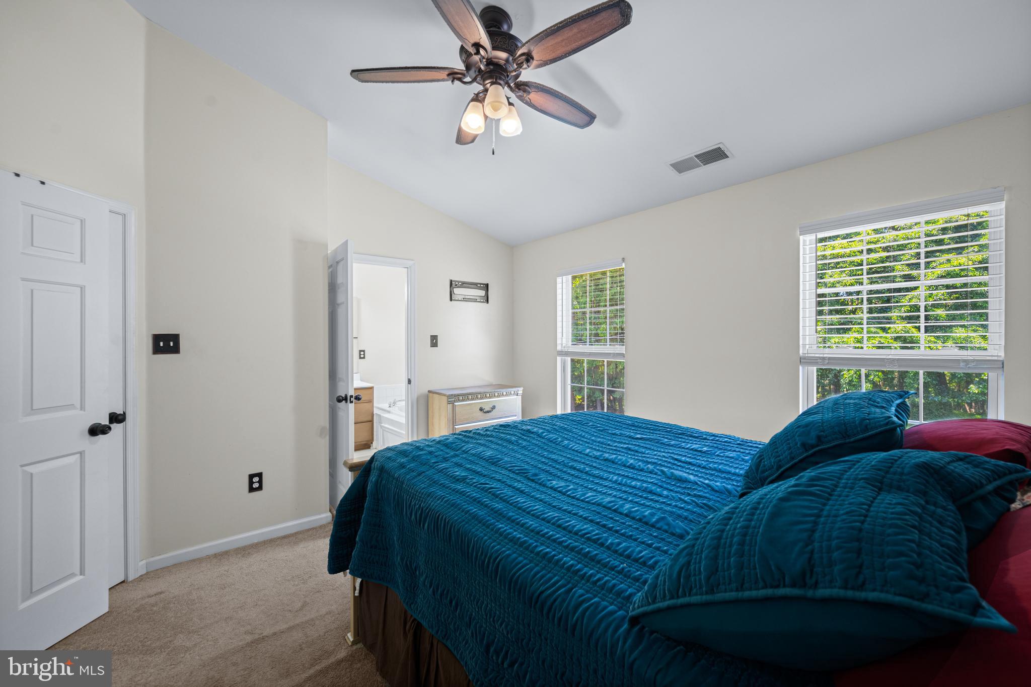 9837 Sherwood Farm Road Owings Mills, MD 21117 - Photo 21 of 35 a bedroom with a bed and a window