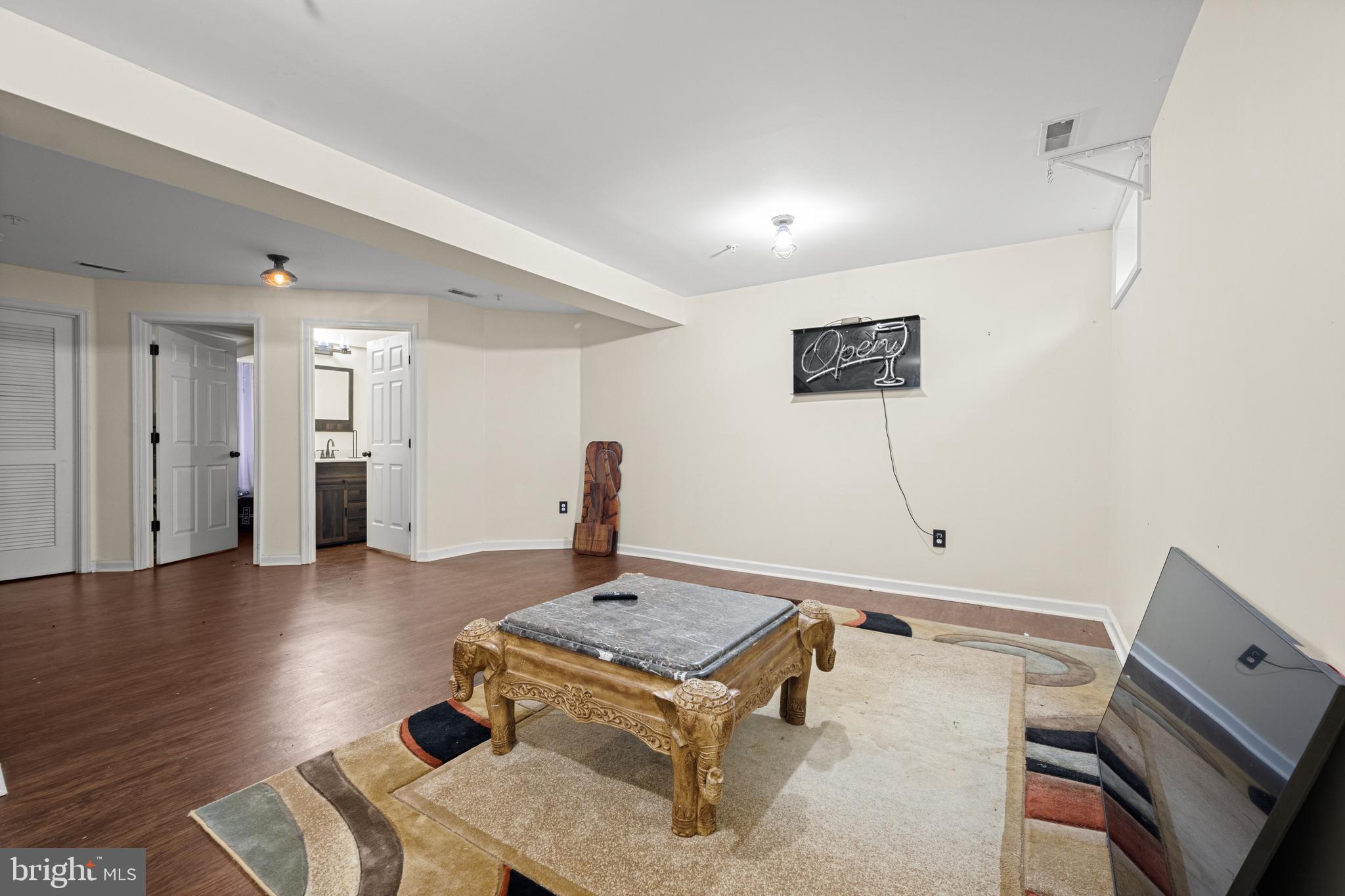 9837 Sherwood Farm Road Owings Mills, MD 21117 - Photo 25 of 35 a living room with furniture and wooden floor