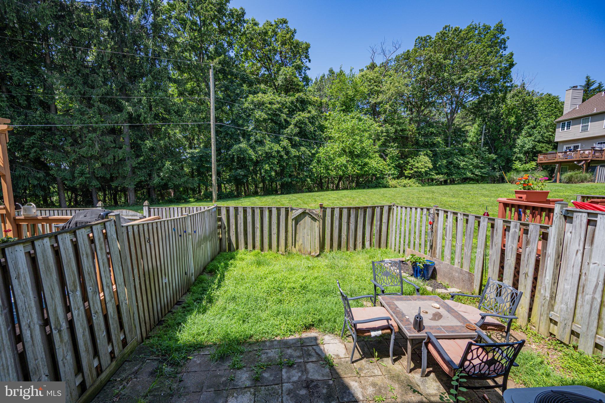 9837 Sherwood Farm Road Owings Mills, MD 21117 - Photo 29 of 35 a view of a chair and tables front of the house