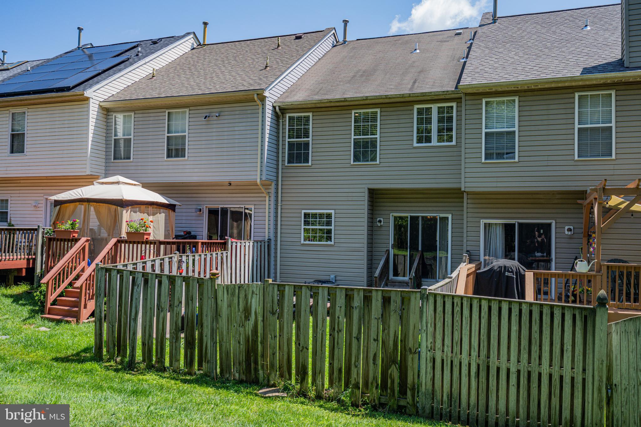 9837 Sherwood Farm Road Owings Mills, MD 21117 - Photo 31 of 35 a view of a house with a yard