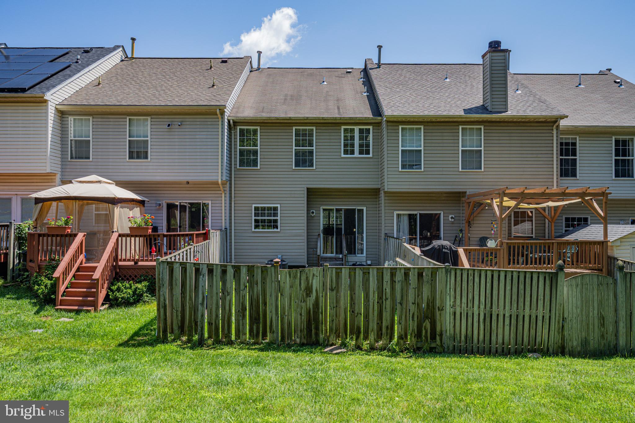 9837 Sherwood Farm Road Owings Mills, MD 21117 - Photo 32 of 35 front view of a house with a yard