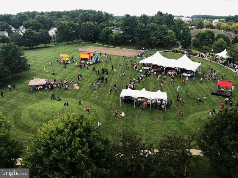9837 Sherwood Farm Road Owings Mills, MD 21117 - Photo 35 of 35 a aerial view of a house with pool green space