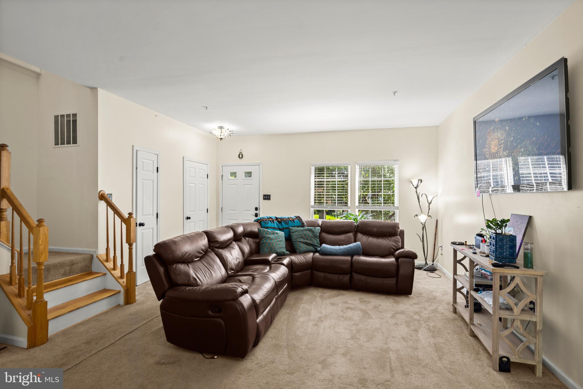 9837 Sherwood Farm Road Owings Mills, MD 21117 - Photo 6 of 35 a living room with furniture and a large window