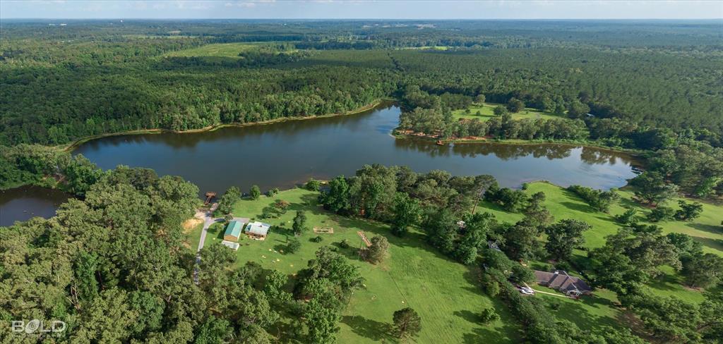 0 Twin Lakes Road Mansfield, LA 71052 - Photo 27 of 28 Expansive lakefront property featuring a private lake, surrounding woodland, and open grassy areas