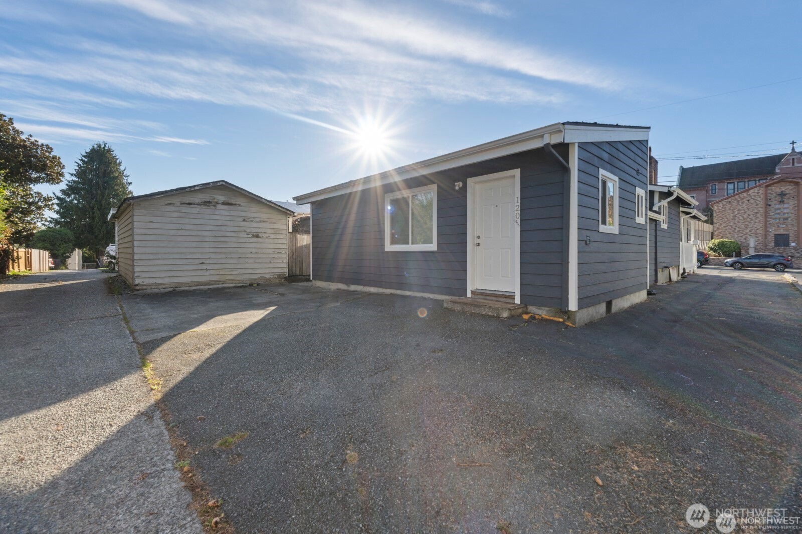 120 North 80th Street Seattle, WA 98103 - Photo 29 of 39 a view of a house with a street