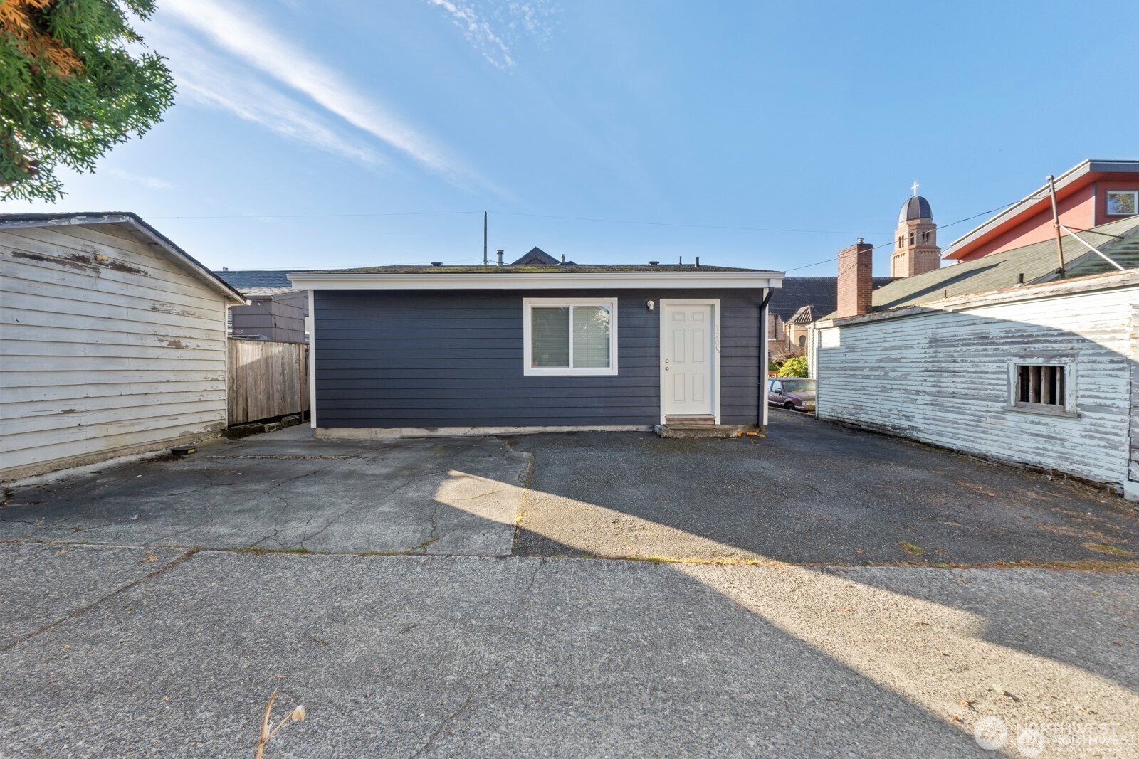 120 North 80th Street Seattle, WA 98103 - Photo 30 of 39 a front view of a house with a yard