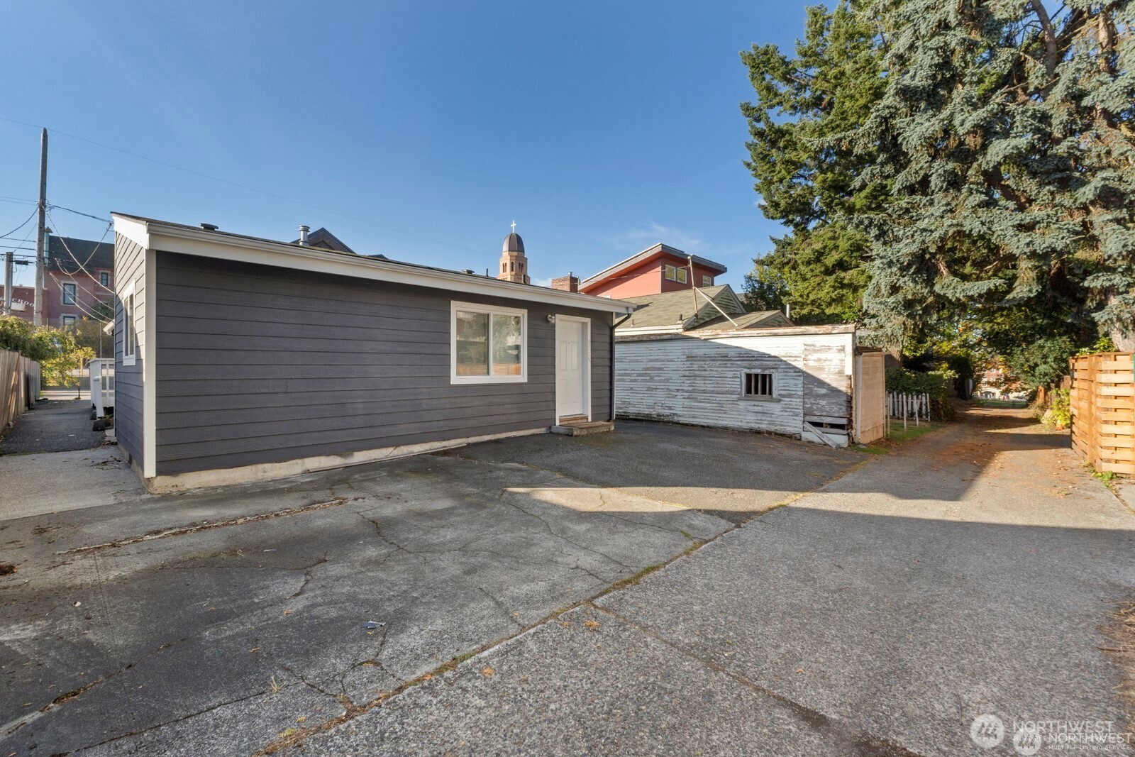 120 North 80th Street Seattle, WA 98103 - Photo 31 of 39 a view of a house with a yard and garage
