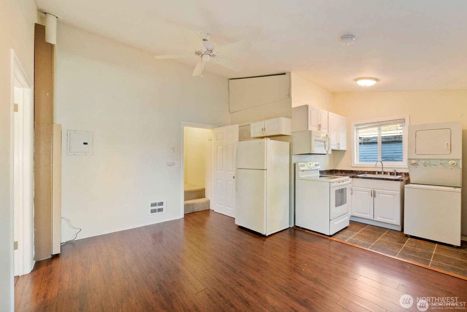 120 North 80th Street Seattle, WA 98103 - Photo 10 of 39 a view of kitchen with wooden floor