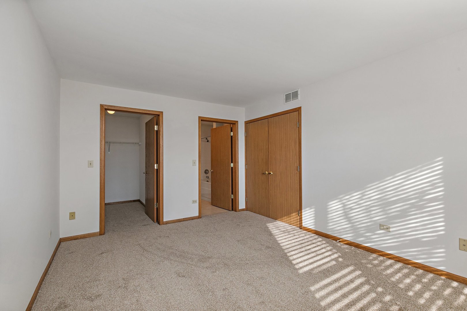 2140 Peach Tree Lane Algonquin, IL 60102 - Photo 13 of 16 a view of an empty room with wooden floor and a window