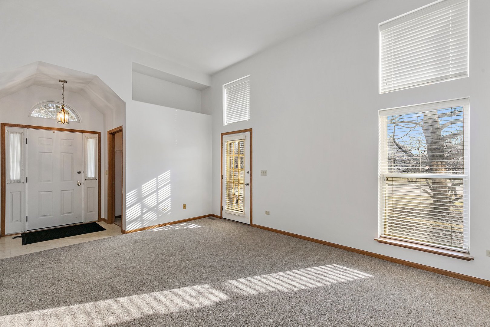 2140 Peach Tree Lane Algonquin, IL 60102 - Photo 3 of 16 a view of empty room with windows