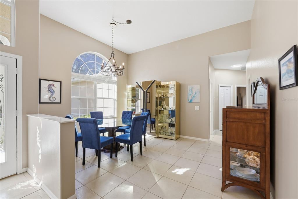 4060 South Kenvera Loop Inverness, FL 34450 - Photo 19 of 50 a view of a dining room with furniture window and wooden floor