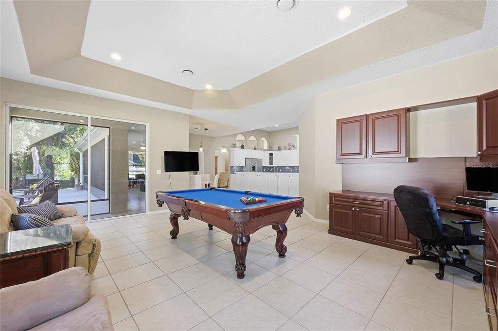 4060 South Kenvera Loop Inverness, FL 34450 - Photo 25 of 50 a room with furniture pool table and a flat screen tv