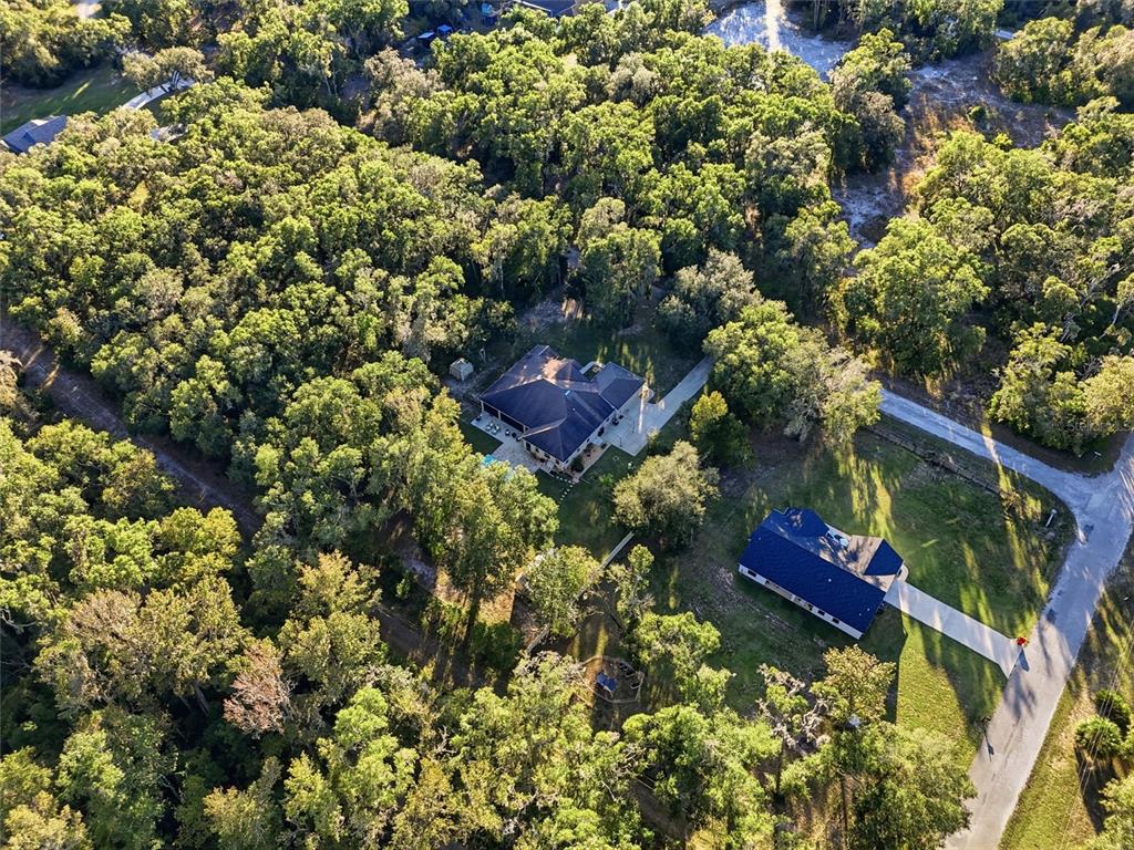 4060 South Kenvera Loop Inverness, FL 34450 - Photo 47 of 50 an aerial view of a house with a yard