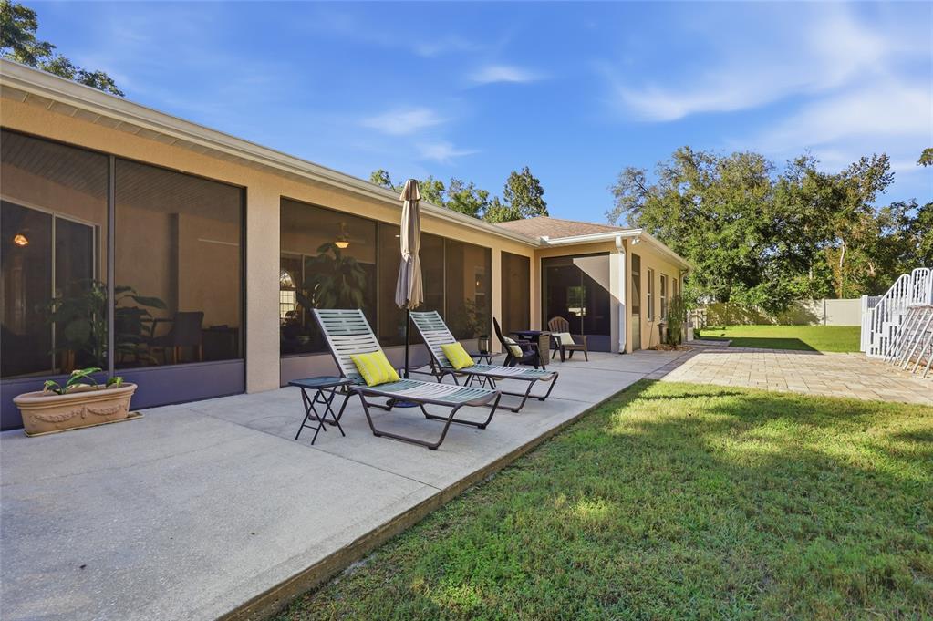 4060 South Kenvera Loop Inverness, FL 34450 - Photo 7 of 50 a view of a house with backyard porch and sitting area