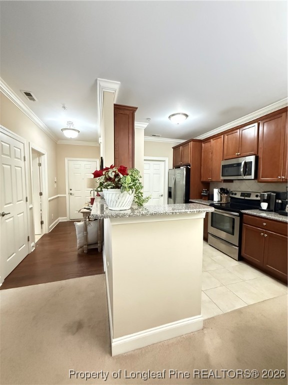 321 Gallery Drive, Unit 203 Spring Lake, NC 28390 - Photo 15 of 25 a kitchen with sink cabinets and outdoor living space