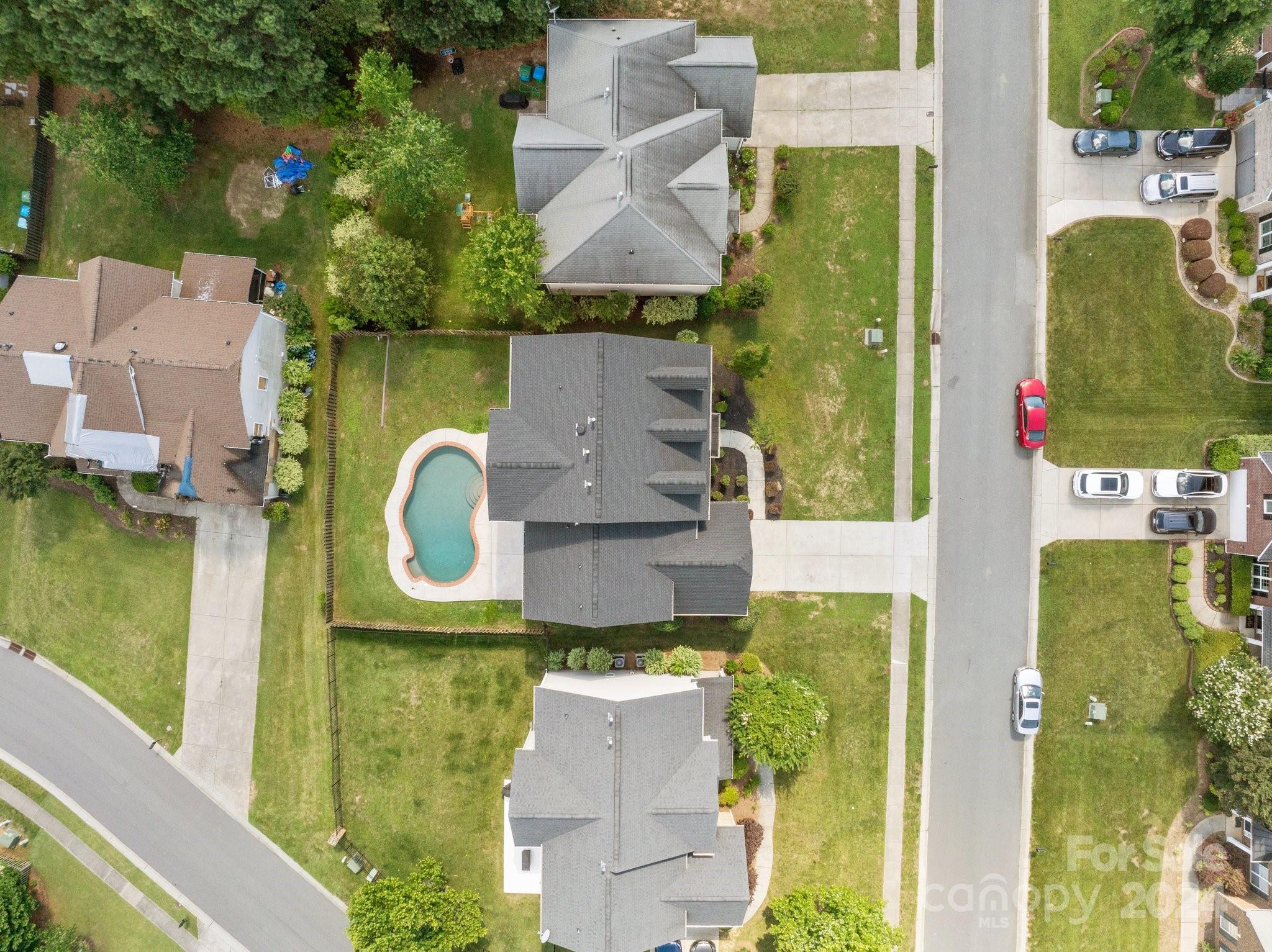 8386 Burgundy Ridge Drive Harrisburg, NC 28075 - Photo 39 of 44 an aerial view of residential house with outdoor space and swimming pool