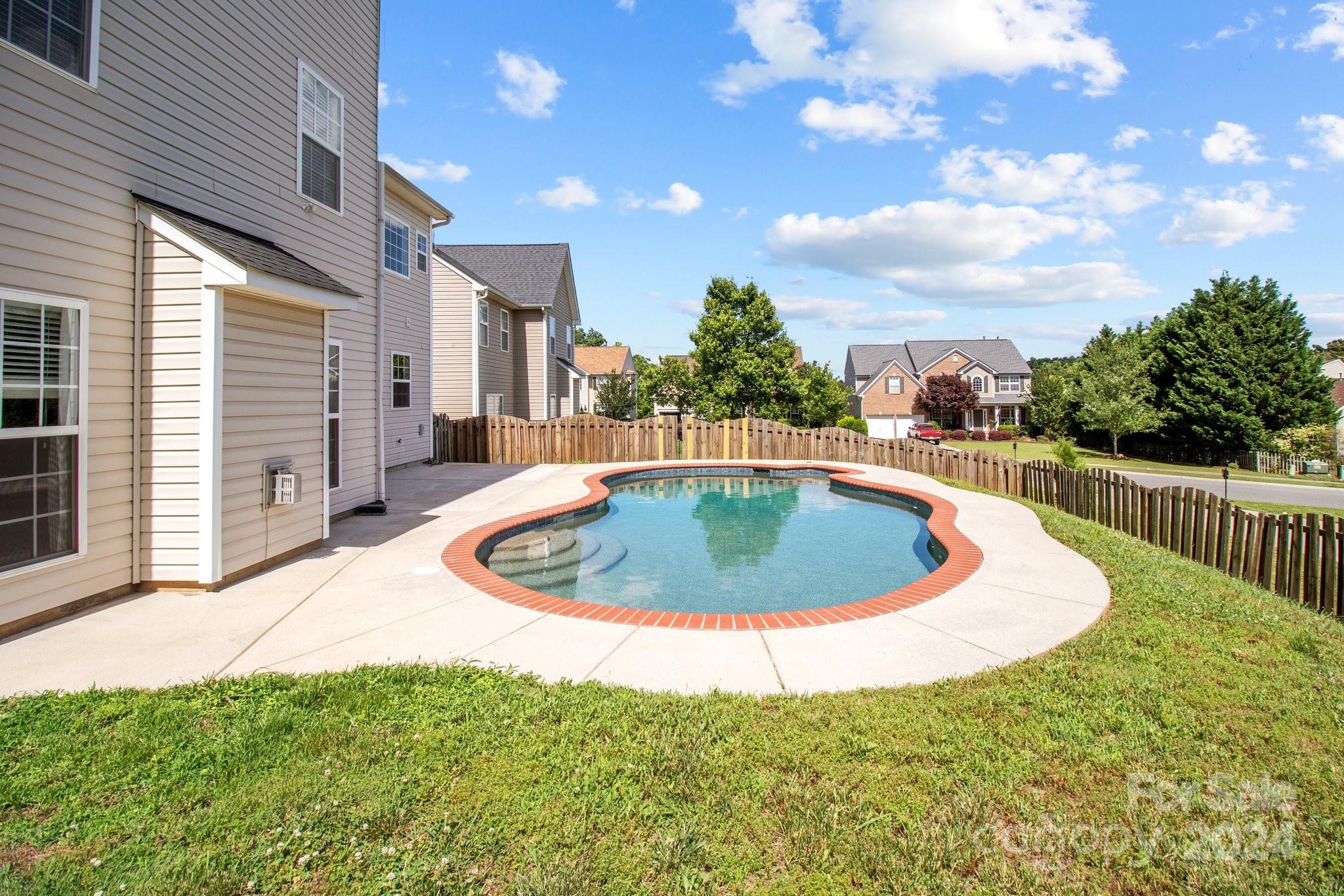 8386 Burgundy Ridge Drive Harrisburg, NC 28075 - Photo 43 of 44 a view of outdoor space and yard