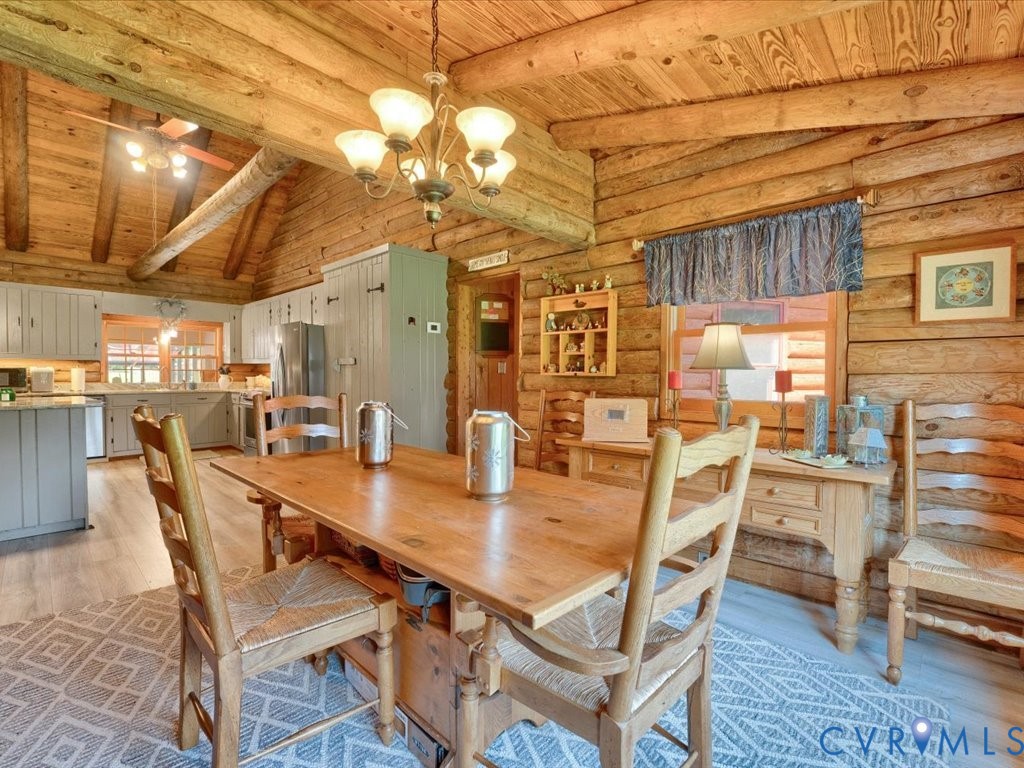 12309 Pinhook Road Rockville, VA 23146 - Photo 27 of 50 Rustic-meets-refined dining area seamlessly connec