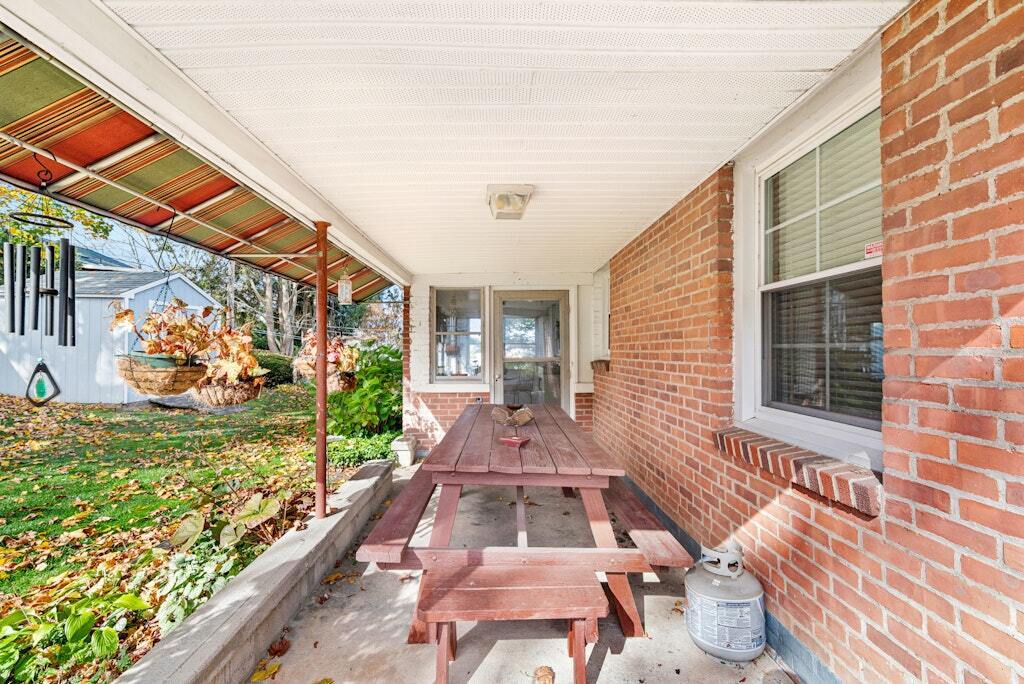 186 Hubbell Avenue Waterbury, CT 06708 - Photo 16 of 20 a front view of a house with a yard