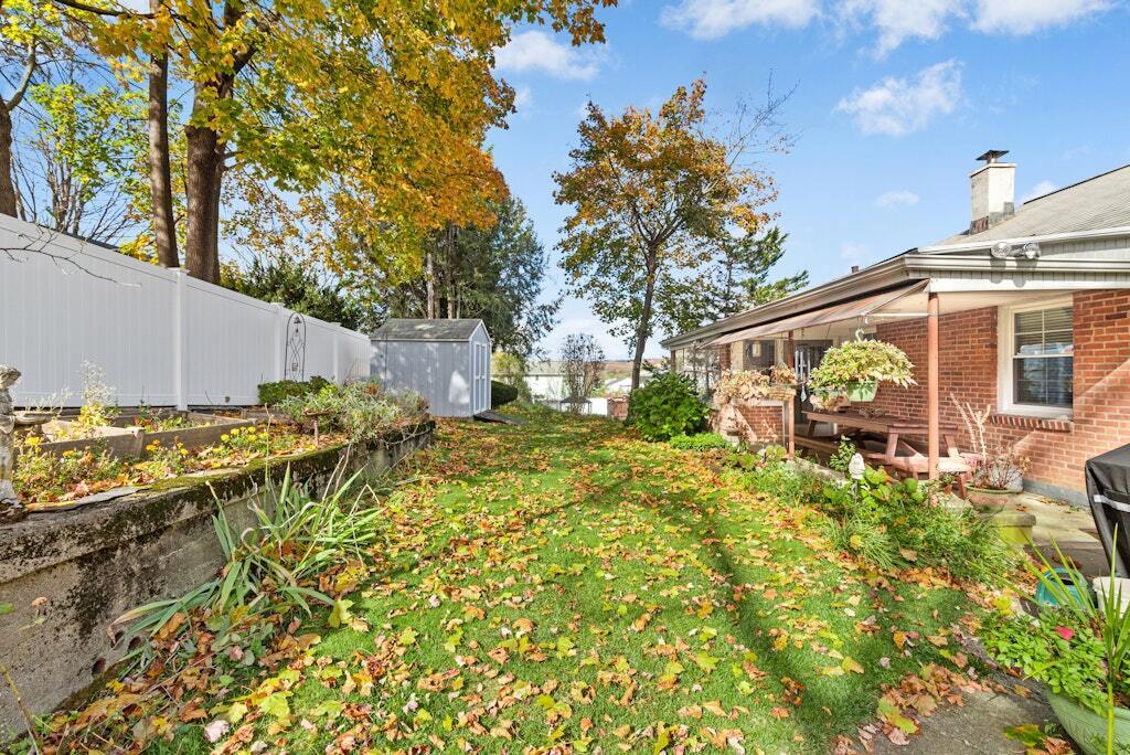 186 Hubbell Avenue Waterbury, CT 06708 - Photo 17 of 20 a view of a house with backyard and sitting area