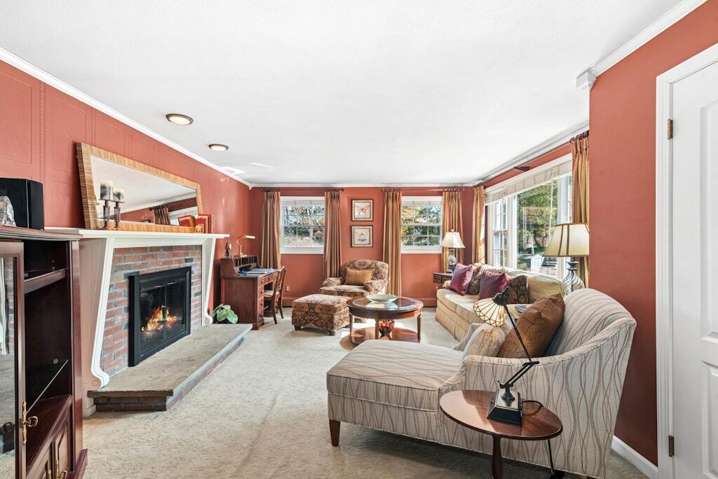 186 Hubbell Avenue Waterbury, CT 06708 - Photo 3 of 20 a living room with furniture and a fireplace