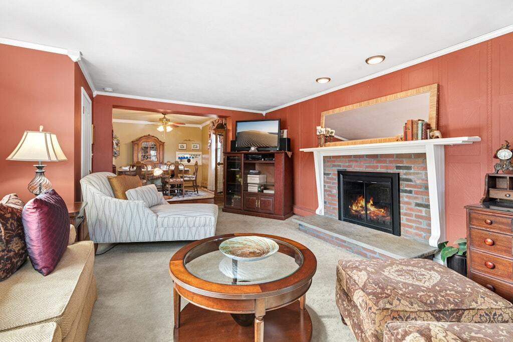 186 Hubbell Avenue Waterbury, CT 06708 - Photo 4 of 20 a living room with furniture and a fireplace