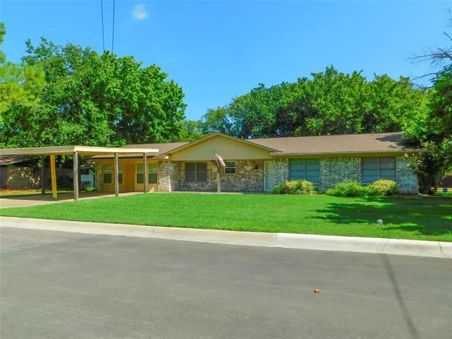 a view of outdoor space yard and front view of a house