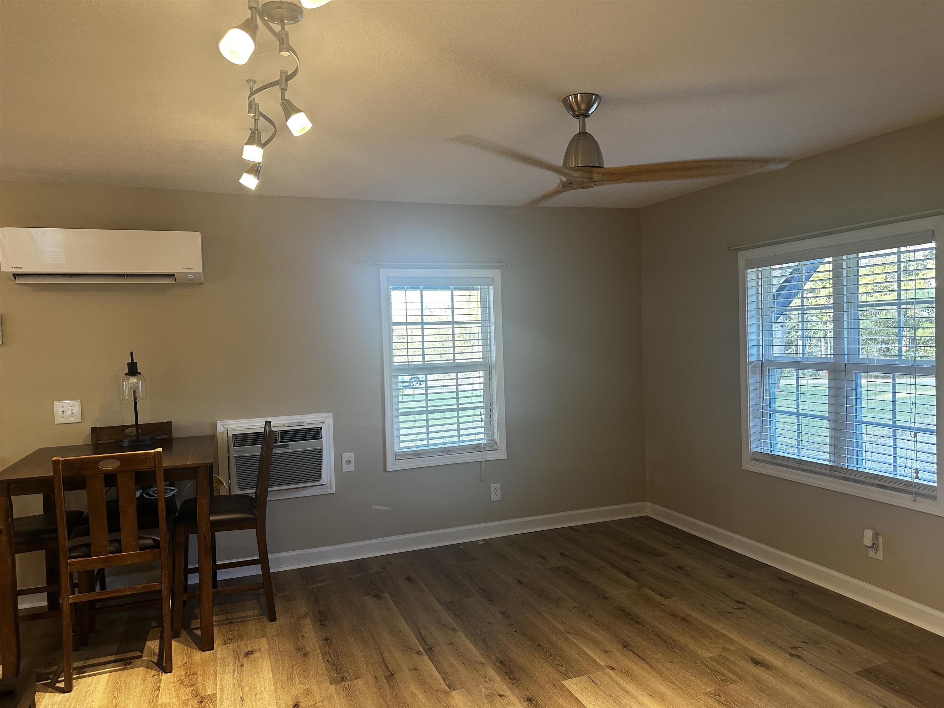110 Catfish Lane Crump, TN 38327 - Photo 12 of 31 a view of a room with furniture window and wooden floor