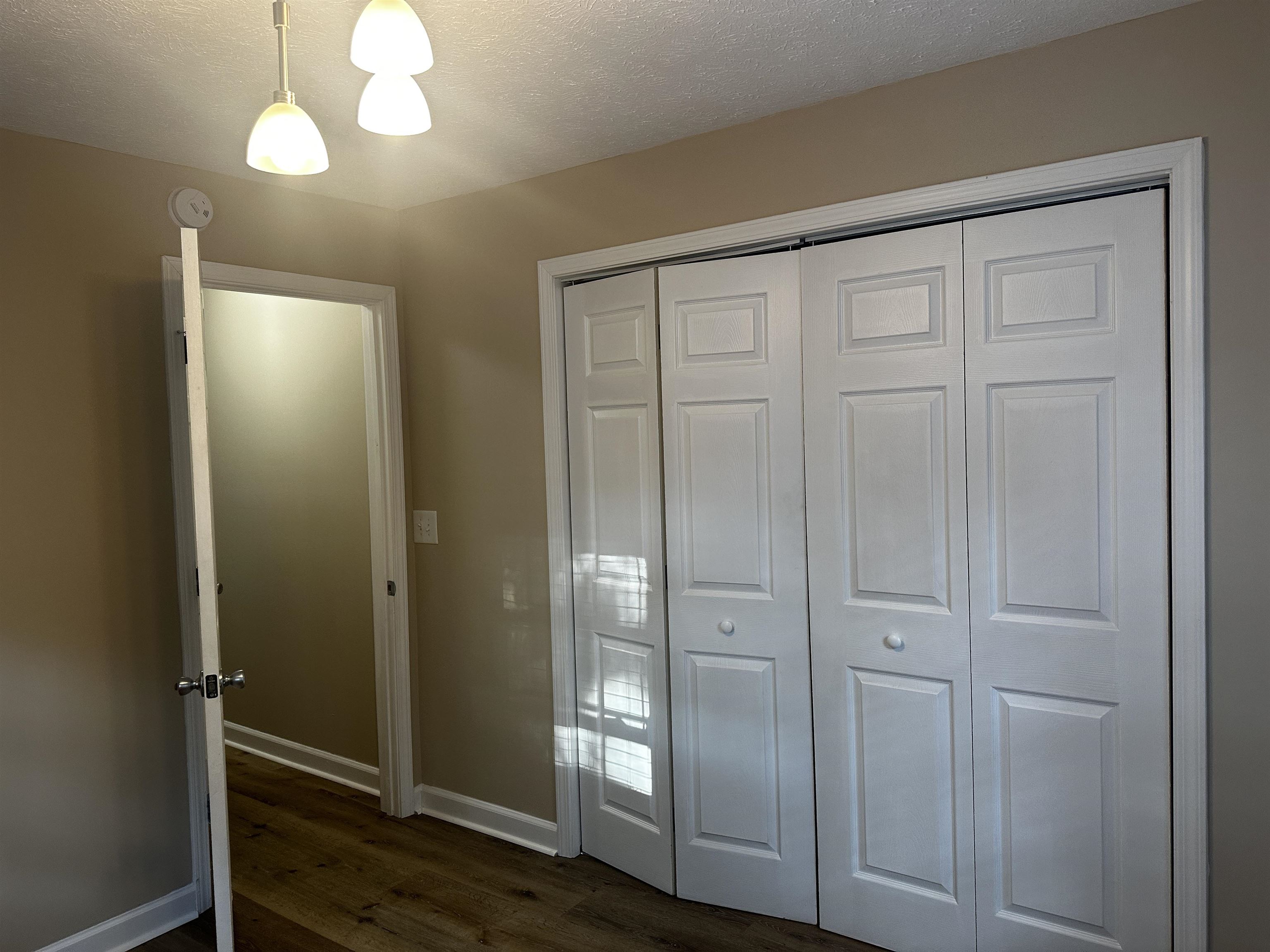 110 Catfish Lane Crump, TN 38327 - Photo 16 of 31 wooden floor in an empty room
