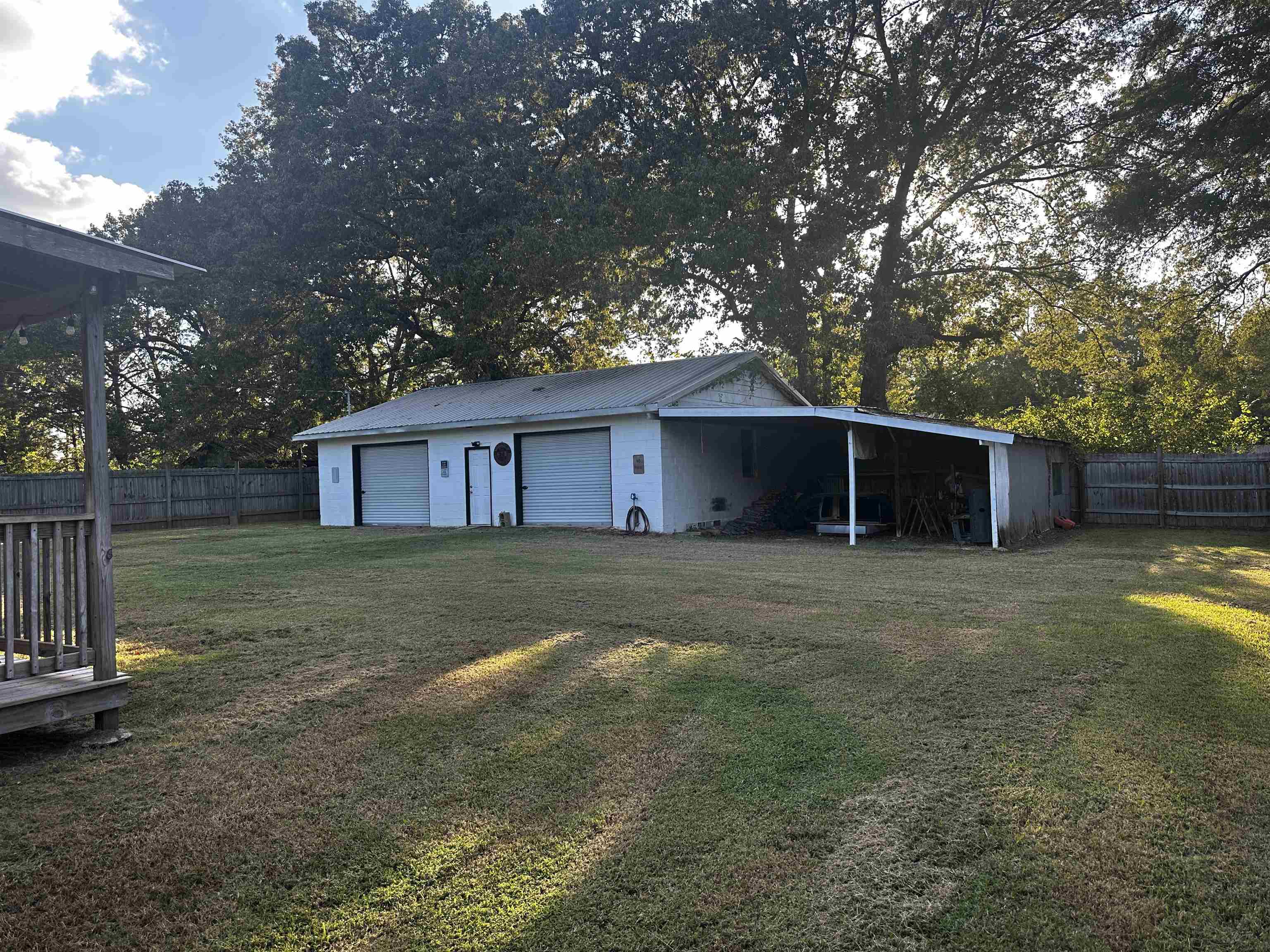 110 Catfish Lane Crump, TN 38327 - Photo 24 of 31 a front view of a house with a yard and a garage
