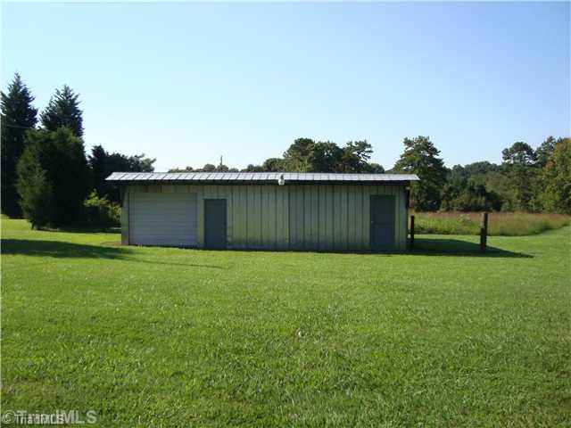 292 Gun Club Road Advance, NC 27006 - Photo 12 of 16 Other. Outbuilding has been previously used for cattle and pasture storage, it contains two seperate areas with overhead garage door and additional storage. Works great for livestock.