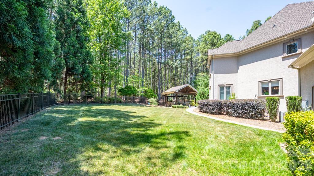 7315 Bay Ridge Drive Denver, NC 28037 - Photo 24 of 39 a view of a backyard of the house