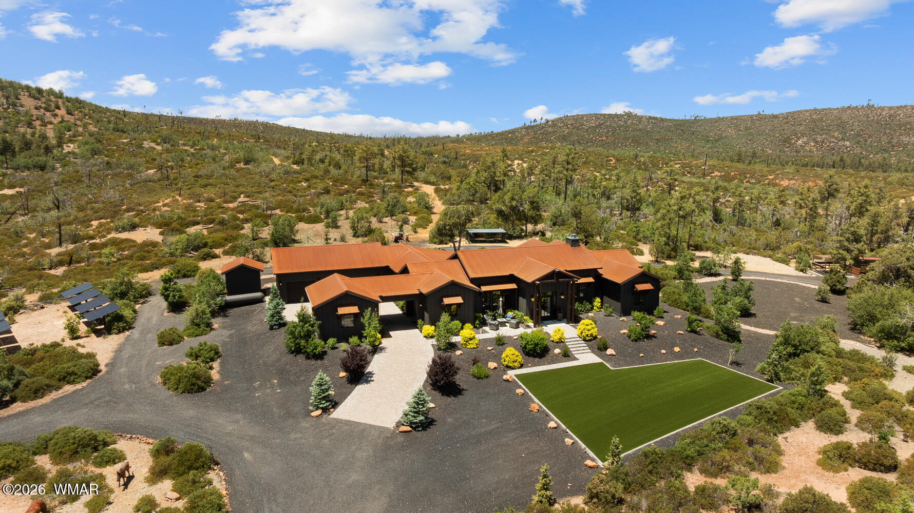 512 Fieldy Road Show Low, AZ 85901 - Photo 109 of 128 an aerial view of a house with a garden