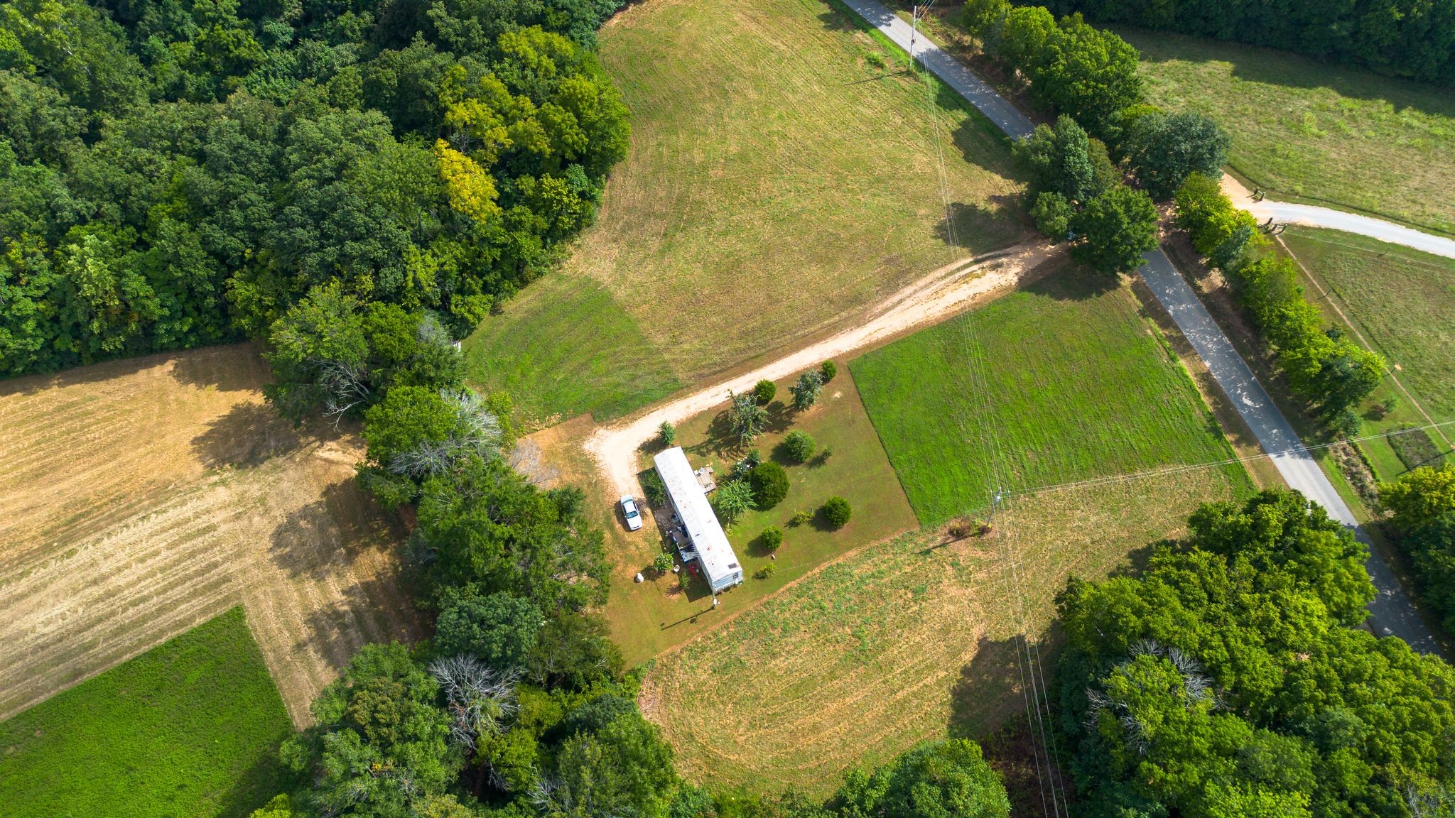 2332 Mobley Ridge Road Duck River, TN 38454 - Photo 15 of 22 a view of a swimming pool with a yard