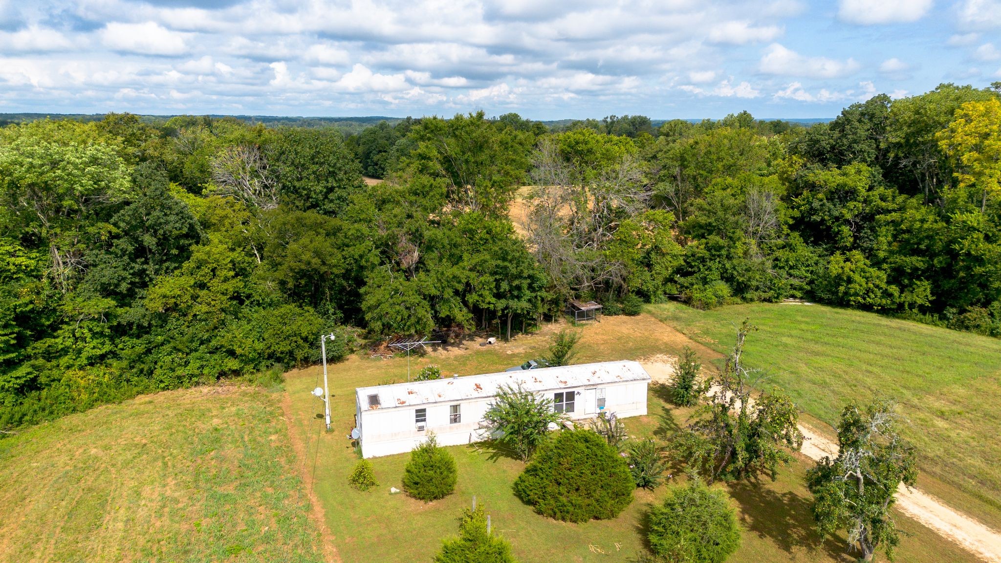2332 Mobley Ridge Road Duck River, TN 38454 - Photo 19 of 22 a view of a lake with a yard