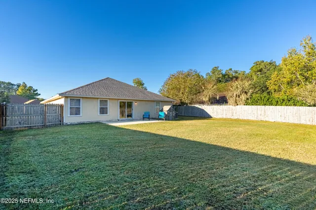 a house view with a garden space