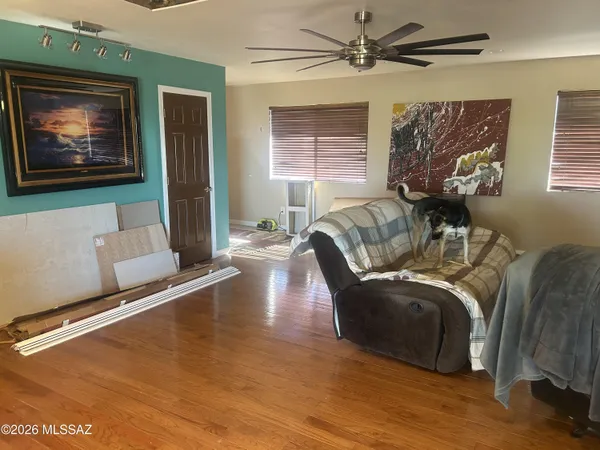a living room with furniture and a window