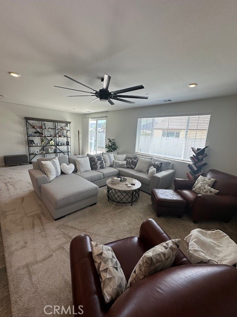 5233 Saloon Street Hemet, CA 92545 - Photo 16 of 28 a living room with furniture and a ceiling fan