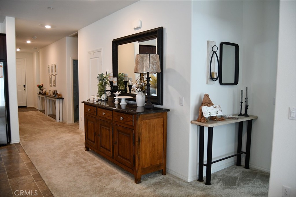 5233 Saloon Street Hemet, CA 92545 - Photo 2 of 28 a kitchen with stainless steel appliances granite countertop a sink and cabinets