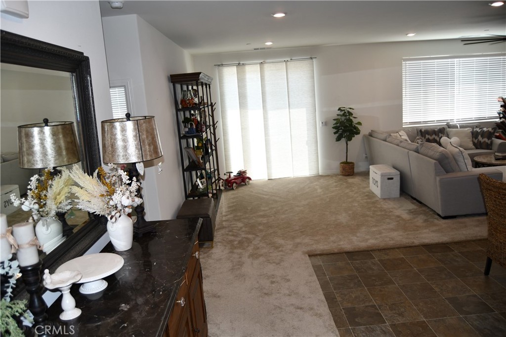 5233 Saloon Street Hemet, CA 92545 - Photo 5 of 28 a living room with furniture flowerpot and wooden floor