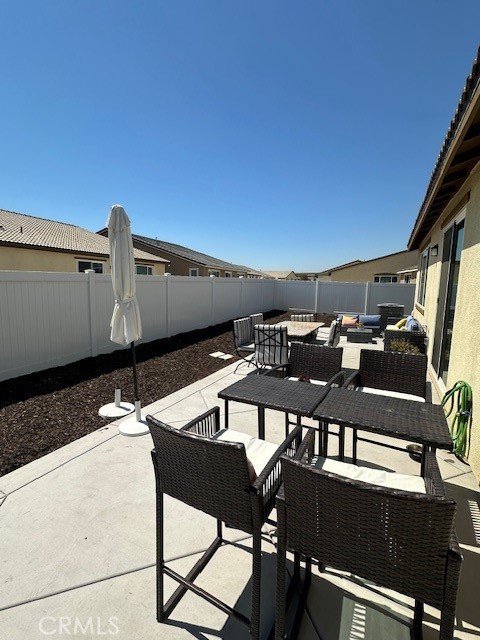 5233 Saloon Street Hemet, CA 92545 - Photo 10 of 28 a view of a chairs and table in the balcony