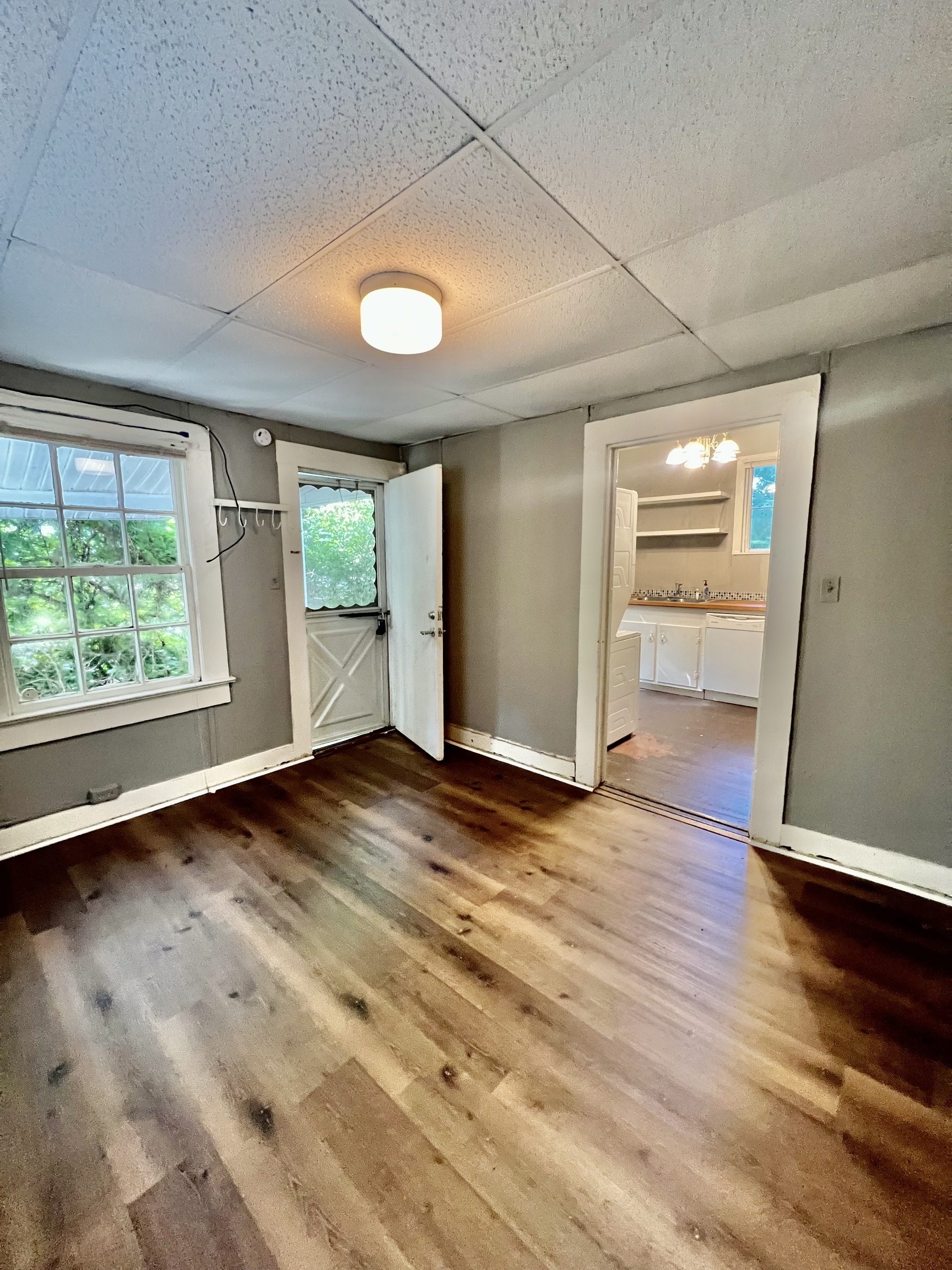 824 Oconee Street, Unit B Athens, GA 30605 - Photo 1 of 1 an empty room with wooden floor and windows